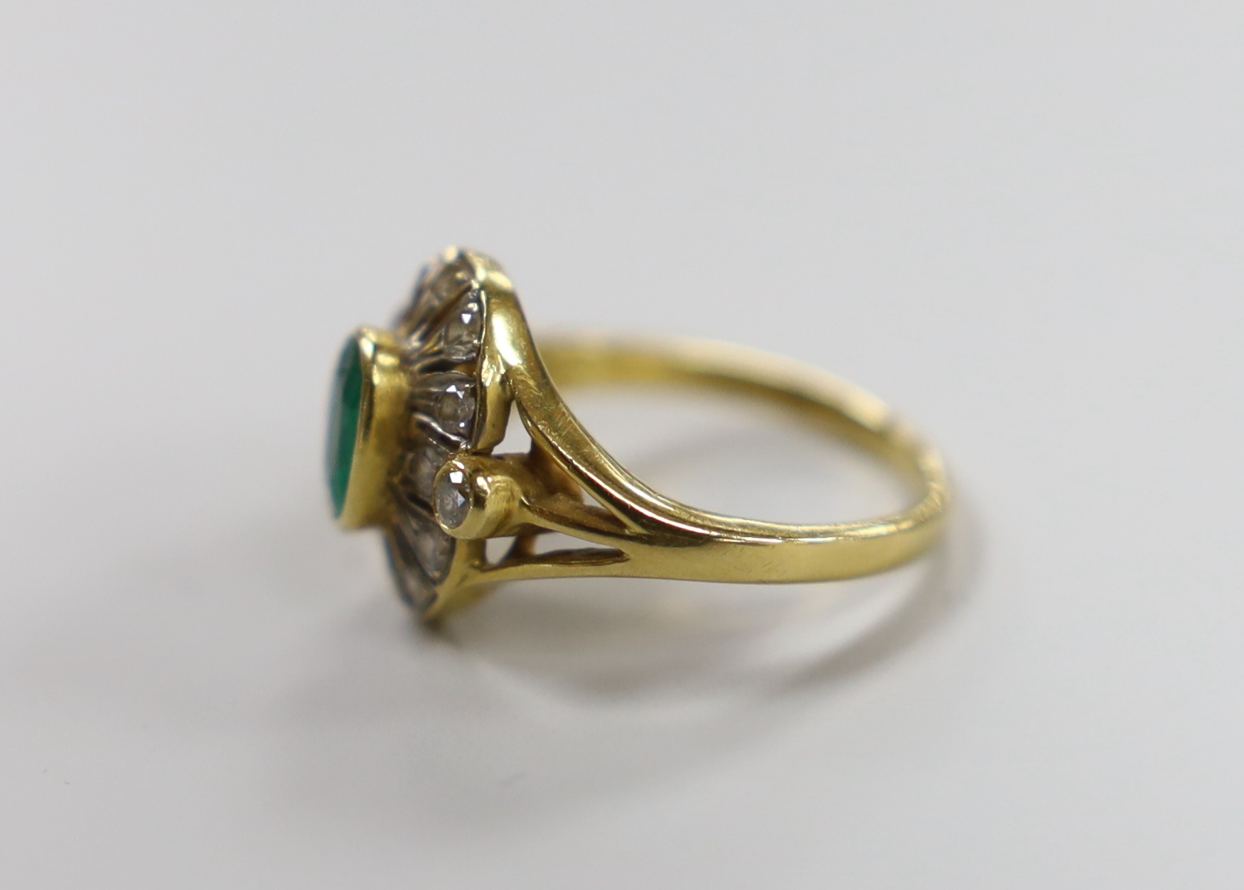 An 18ct gold emerald and diamond cluster ring, size M, gross 4.5 grams - Image 2 of 3