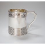 A George III silver christening can, with reeded borders, makers mark rubbed, London 1803, 7.5cm,