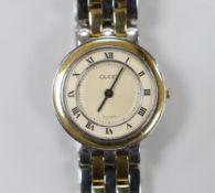 A lady's gold and steel Gucci quartz wrist watch