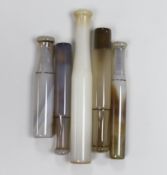 Four Chinese agate opium pipe mouthpieces and a similar glass example, largest 13cm high (5)