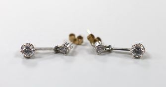 A pair of early 20th century diamond two stone drop earrings, 2cm