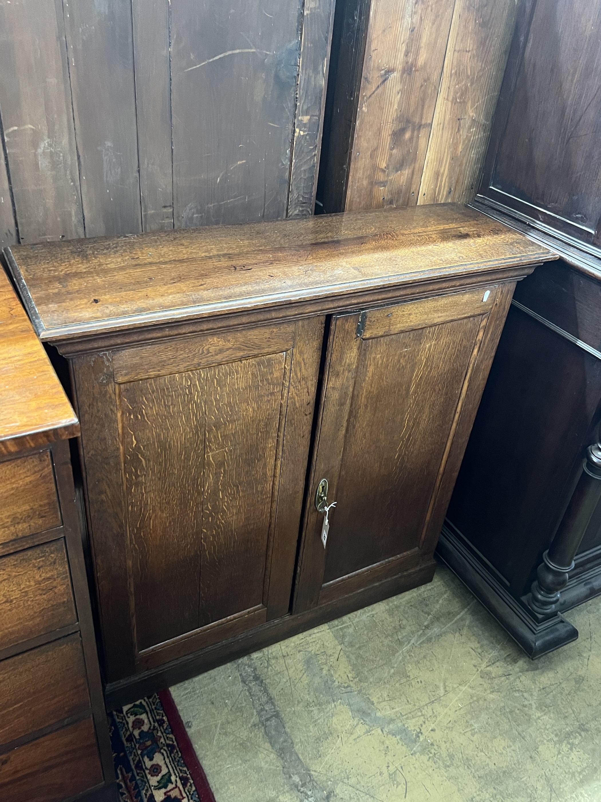 A George III oak two door side cabinet, (adapted) width 100cm, depth 32cm, height 102cm - Image 2 of 3