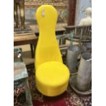 A contemporary yellow high back chair with circular seat, width 51cm, height 126cm