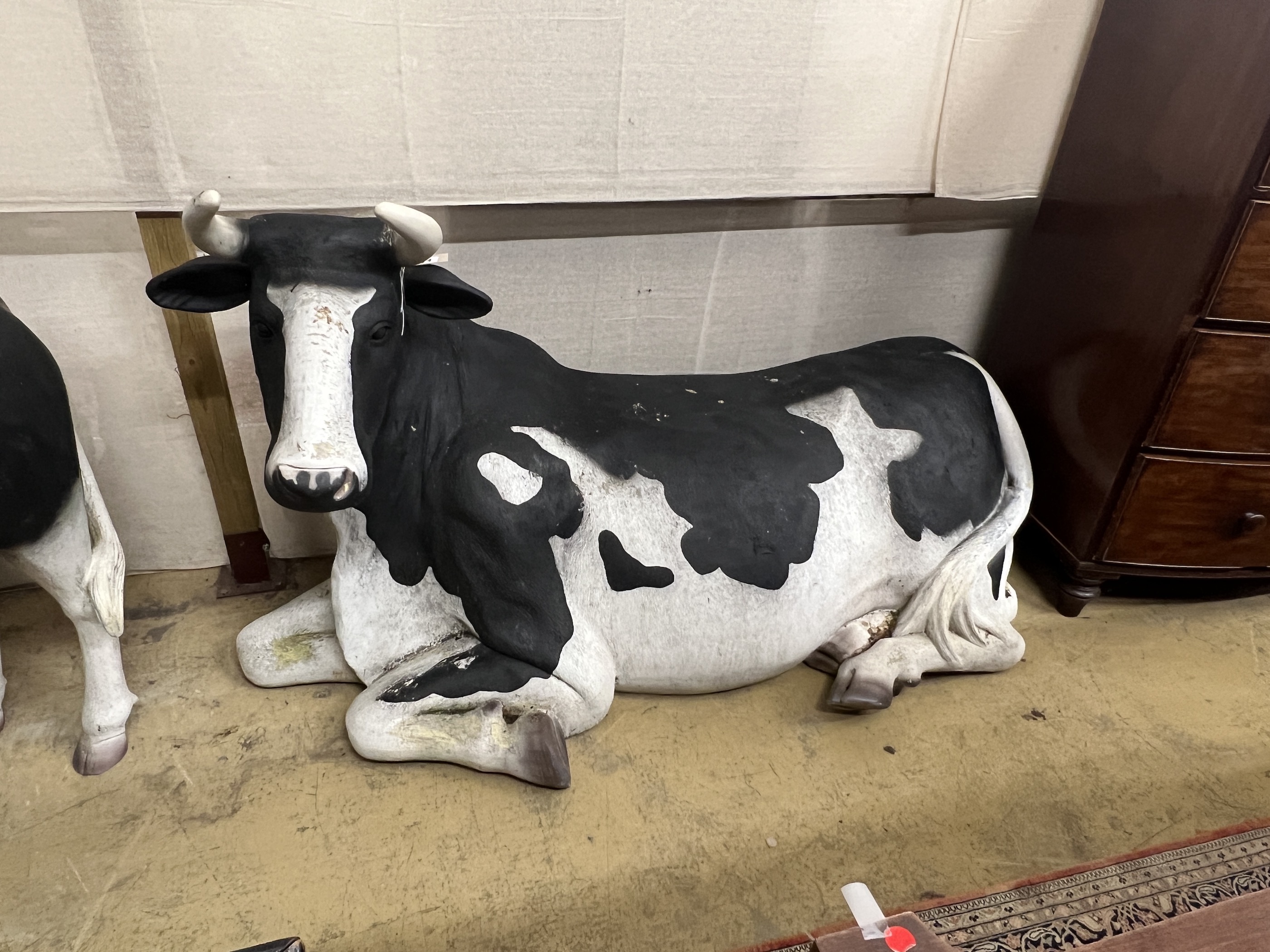 A life size composition recumbent Friesian cow garden ornament, length 180cm, height 103cm - Image 2 of 3