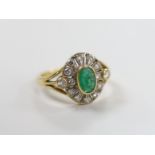 An 18ct gold emerald and diamond cluster ring, size M, gross 4.5 grams