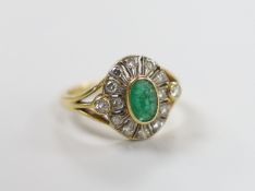 An 18ct gold emerald and diamond cluster ring, size M, gross 4.5 grams