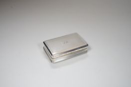 A George III engine turned rectangular silver snuff box, with later internal presentation