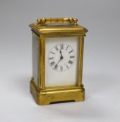 A French miniature carriage timepiece by Henri Jacot with enamel dial and leather case, 9.5cm high