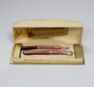 A boxed Waterman's pen and pencil Ladies Writing Set, comprising a pink striated model 512V and