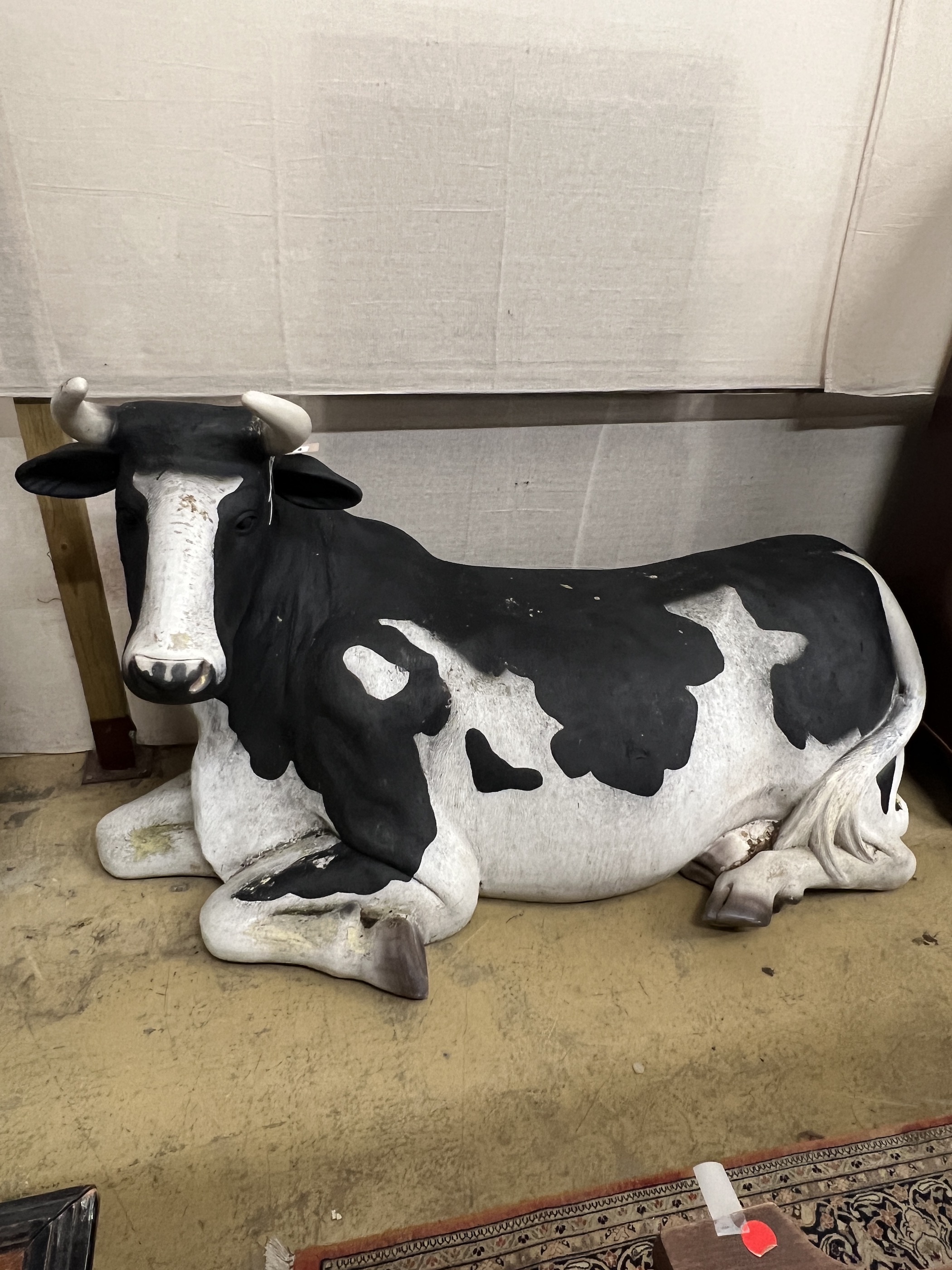 A life size composition recumbent Friesian cow garden ornament, length 180cm, height 103cm - Image 3 of 3