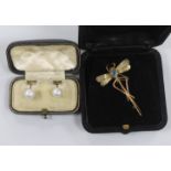 A 9ct gold gem set dragonfly brooch, 4.75cm, gross 3.2 grams and a pair of cultured pearl ear studs,