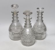Three William IV cut glass decanters, all in a similar design with three neck rings and two with