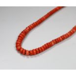 A coral bead necklace, overall 101cm