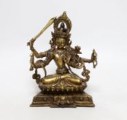 A Sino-Tibetan bronze figure of Avolekshvara, 17cm high