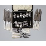 A cased set of twelve Elizabeth II silver Old English pattern coffee spoons, Sheffield 1967, 112