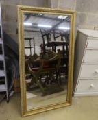 A Victorian rectangular giltwood and composition wall mirror, width 78cm, height 140cm