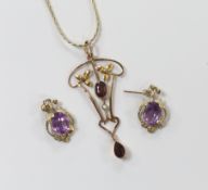 A 9ct gold Art Nouveau style amethyst and seed pearl set pendant, on gilt chain and a pair of gilt