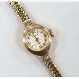 A lady's 9ct gold Baume wrist watch, gross 11.2 grams