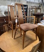 A set of five mid century Niels Koefoed Danish teak 'Eva' dining chairs, two with arms, width
