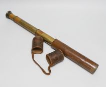 A Broadhurst Clarkson & Co Ltd brass and leather three draw telescope