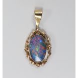 A 9ct gold and blue opal doublet pendant, 3.25cm