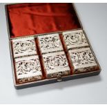 A cased set of six Continental white metal napkin rings, of unusual rounded rectangular form, with