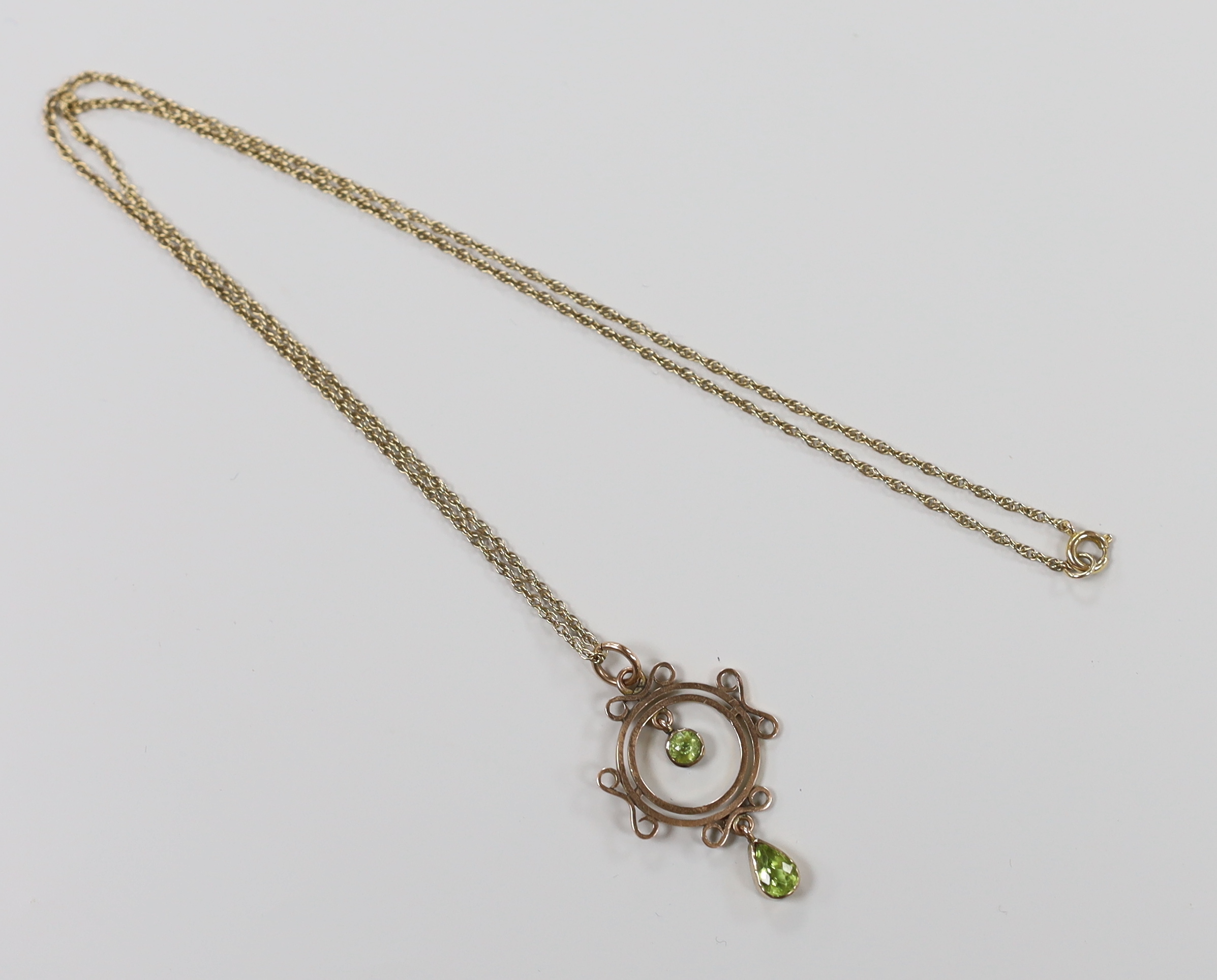 An early 20th century rose gold and peridot pendant necklace, on later chain, gross 3.5 grams and - Image 4 of 4