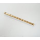 A 9ct gold swizzle stick, 7.75cm, 3.9 grams