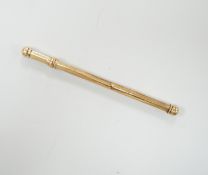 A 9ct gold swizzle stick, 7.75cm, 3.9 grams