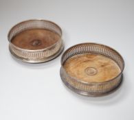 A pair of Elizabeth II silver mounted mahogany wine coasters, with pierced sides, London 1986, 12.