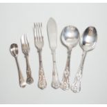 An eight place silver plated cutlery set