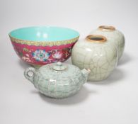 A Chinese enamelled bowl, a pair of celadon bowls and a Chinese wine pot, tallest 12.5cm