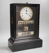 A 19th century ebonised mantel clock combined perpetual calendar, 44cm tall