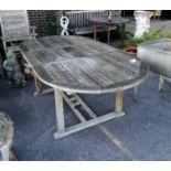 A weathered teak extending garden table, length 211cm extended, depth 110cm, height 75cm