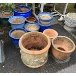 Twelve assorted earthenware garden planters, largest diameter 50cm, height 32cm