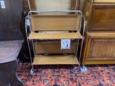 A 1960's Foldamatic chrome and formica folding tea trolley, height 77cm