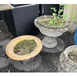 Two reconstituted stone and terracotta campana garden urns, larger diameter 55cm, height 46cm