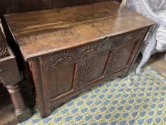 A 17th century oak coffer, width 102cm, depth 48cm, height 63cm