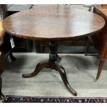 A George III circular oak tilt top tea table, diameter 87cm, height 69cm