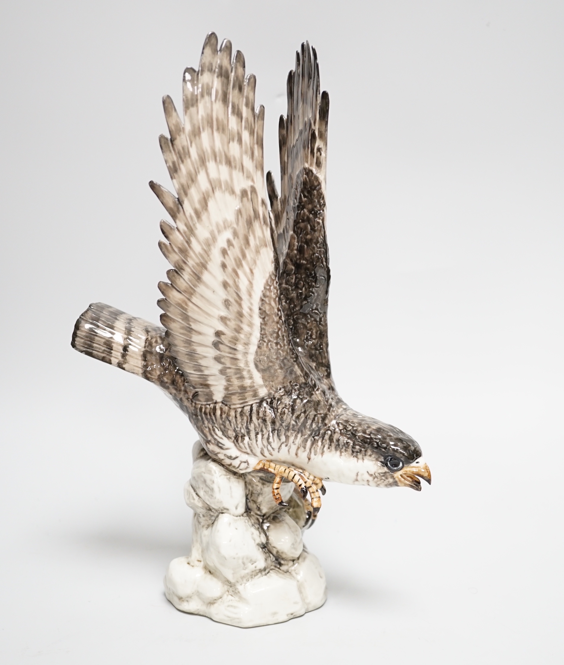 A Spanish porcelain falcon, with ‘PM’ mark to base and ‘Syra P. Garcia 43 Barcelona’ applied