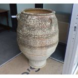 A Greek earthenware oil jar, height 100cm