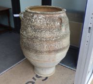 A Greek earthenware oil jar, height 100cm