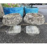 A pair of circular reconstituted stone garden planters, diameter 40cm, height 37cm