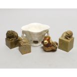 Three Chinese soapstone seals, a pottery bird and a blanc de chine pot