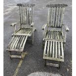 A pair of Barlow Tyrie weathered teak garden steamer chairs, width 60cm, height 96cm