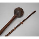 A knobkerrie and another tribal carving, longest 99cm