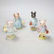 Twelve Beswick Beatrix Potter character pigs