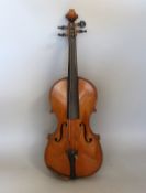 A half size French violin, cased, 51cm long