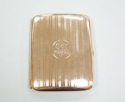 A George V 9ct gold cigarette case, 82mm, gross weight 69 grams.