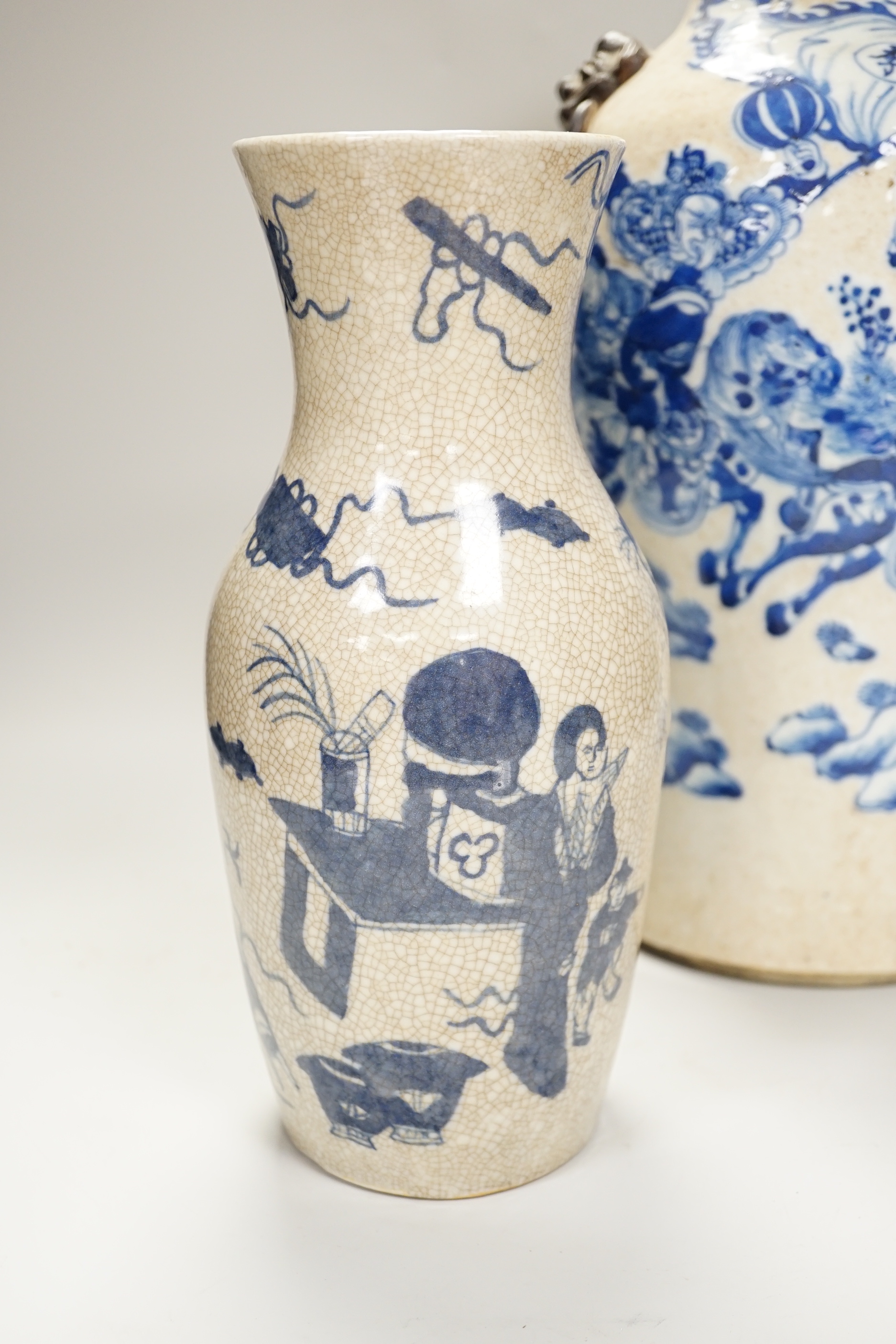 An early 20th century Chinese crackle glaze blue and white vase, 44cm and a later smaller vase - Image 3 of 8
